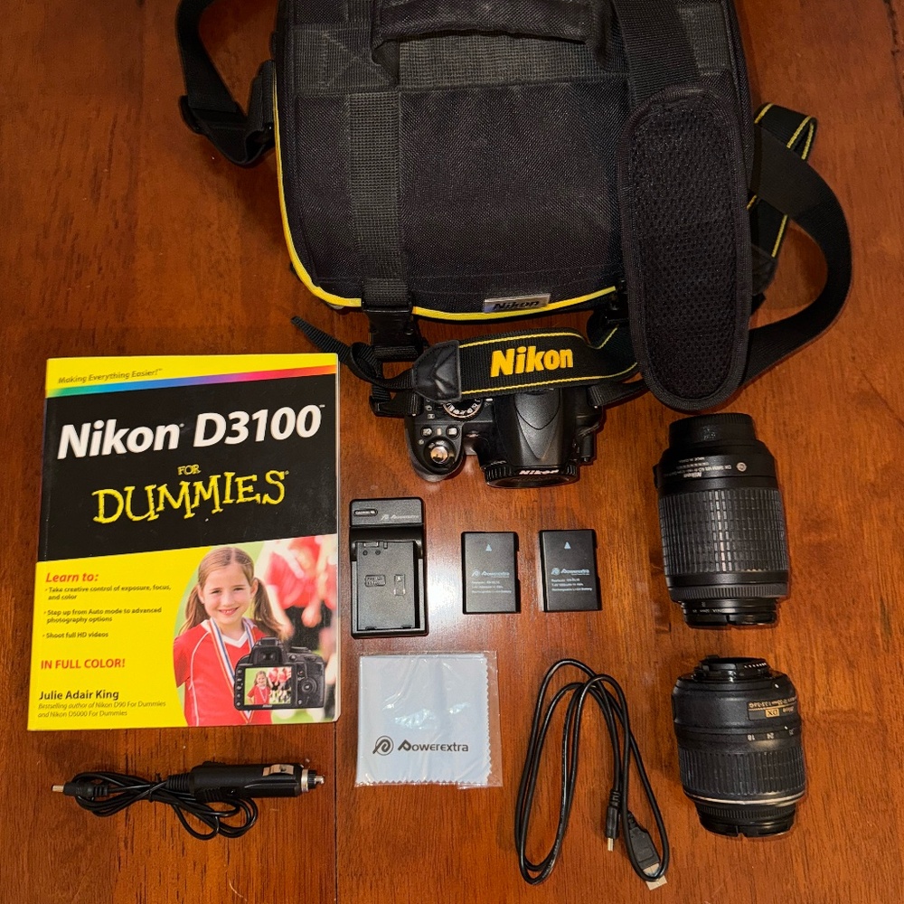 Nikon D3100 with 18-55mm lens + 55-200mm lens